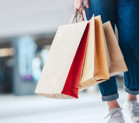 A woman holding shopping bags